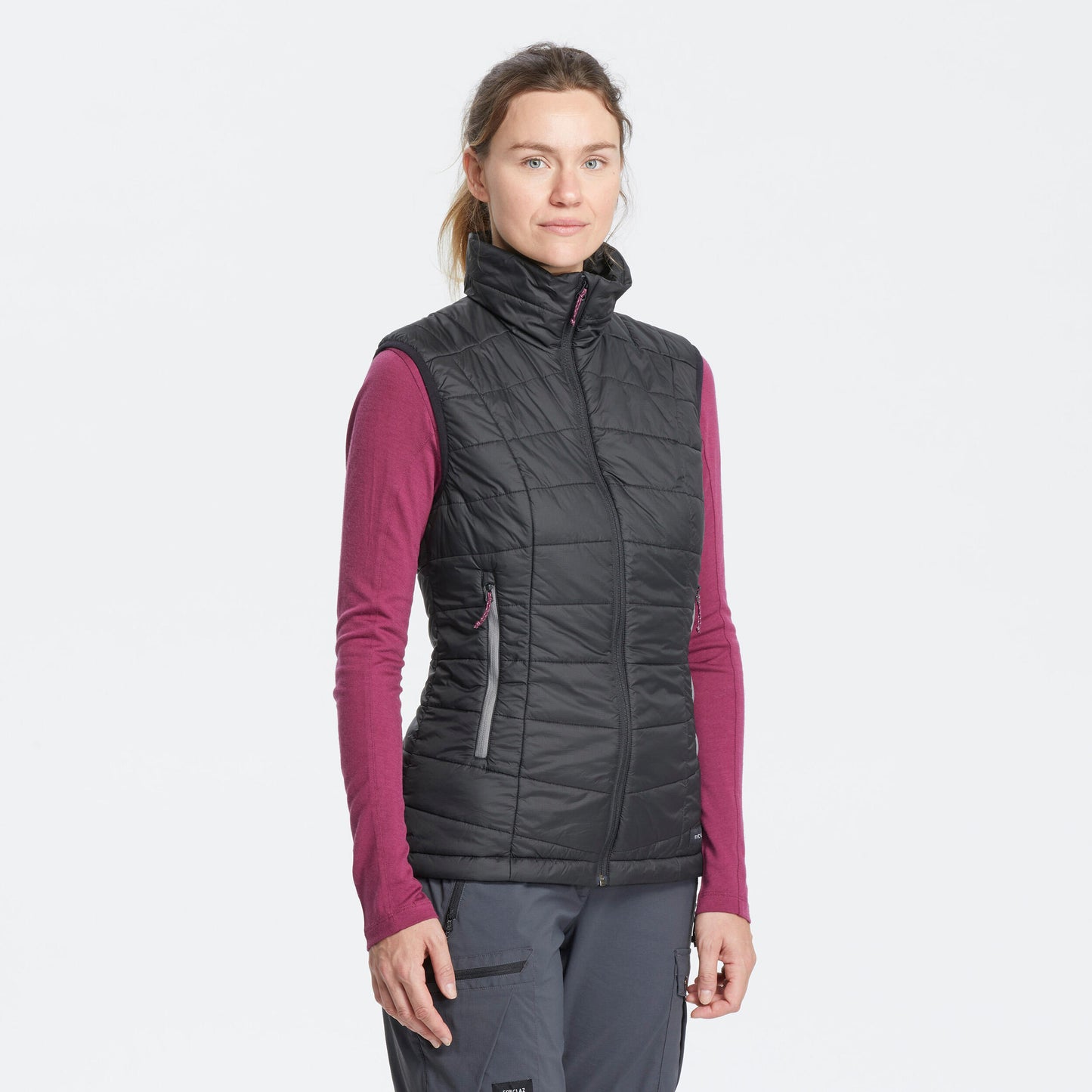 Women's synthetic sleeveless trekking padded jacket MT100 - Black